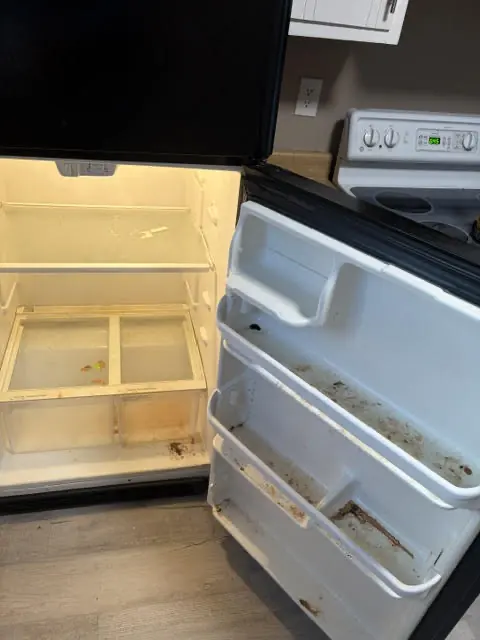Before: Refrigerator clean-out on a turnover