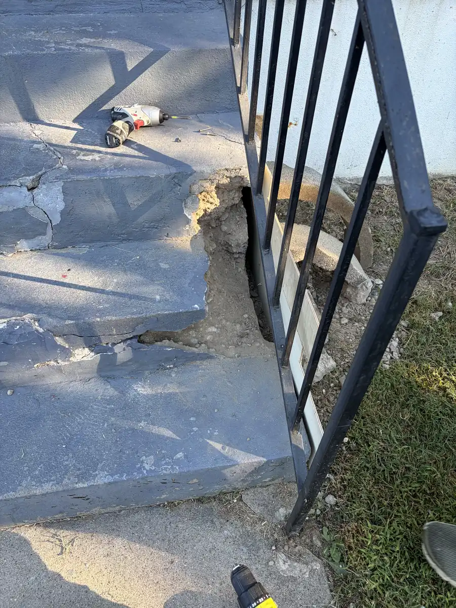 Before: Front steps rebuilt and painted, new rail