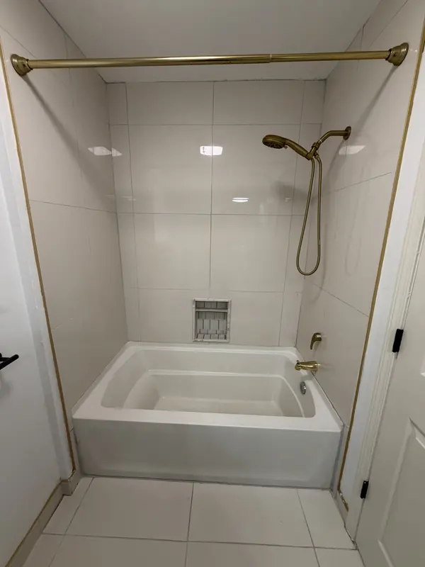 New tub surround and fixtures