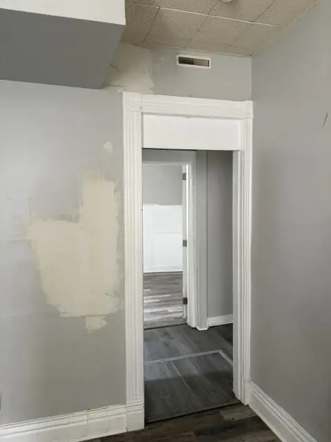 Before: Drywall patched, sanded and painted